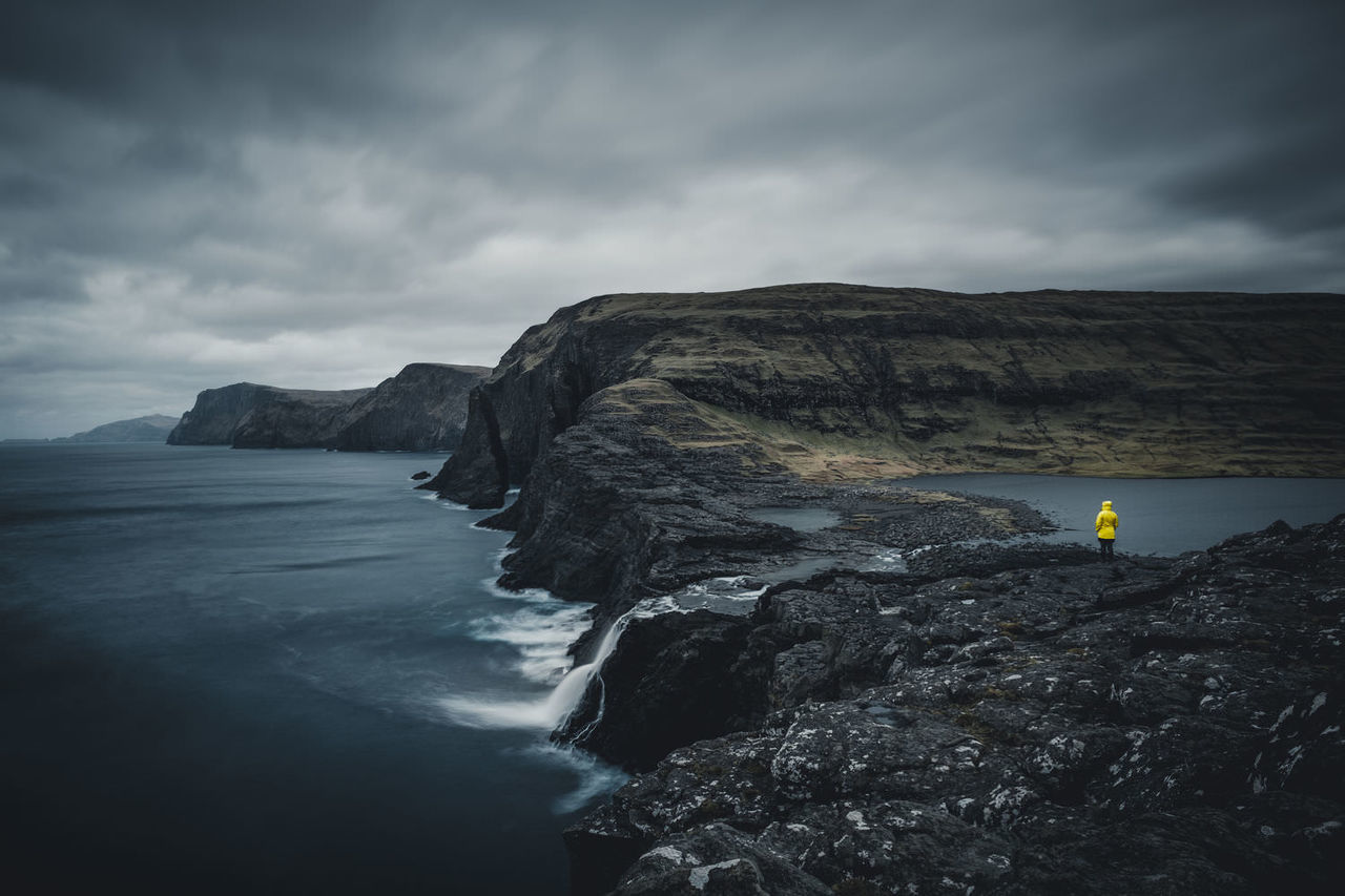 rock, water, scenics - nature, cloud - sky, solid, rock - object, sea, beauty in nature, sky, mountain, nature, rock formation, tranquility, tranquil scene, non-urban scene, cliff, adventure, land, outdoors, formation