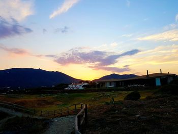 Scenic view of mountains against sky during sunset