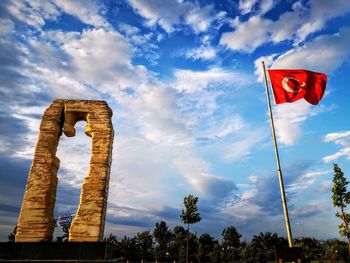 Low angle view of flag against sky