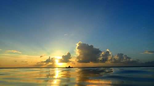 Scenic view of sea at sunset