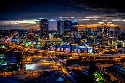 High angle view of illuminated city at night