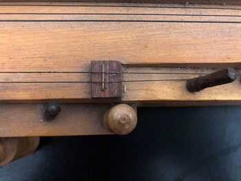 High angle view of rusty metal on wooden door