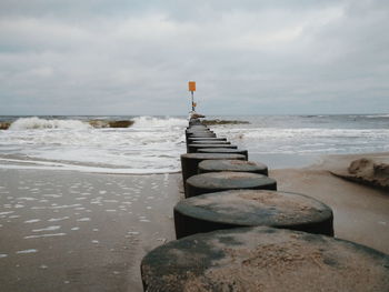 Scenic view of beach against sky