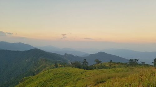 Scenic view of landscape against sky during sunset