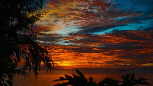 Scenic view of sea against dramatic sky