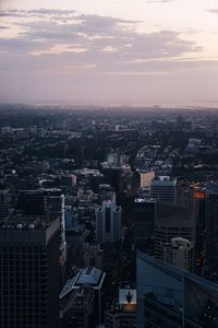 High angle view of buildings against sky during sunset