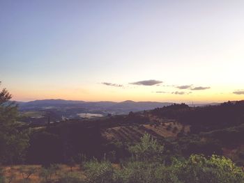 Scenic view of landscape against sky during sunset