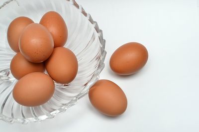 High angle view of eggs on white table