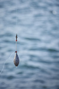 Close-up of fishing net on sea