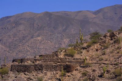 Stone wall with mountain in background