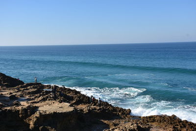 Scenic view of sea against clear sky