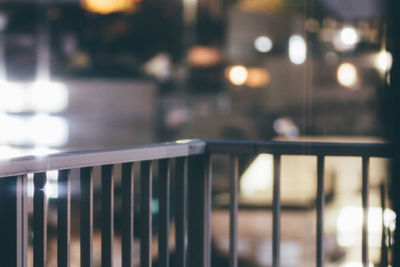 Close-up of illuminated lamp at night