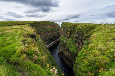 Scenic view of land against sky