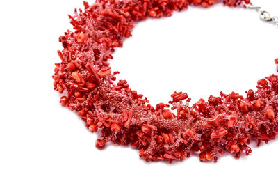 Directly above shot of heart shapes on white background