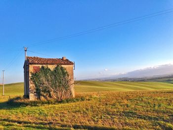 Agricultural field against clear sky