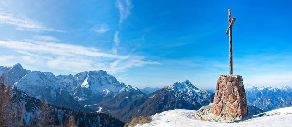 Scenic view of snowcapped mountains against sky