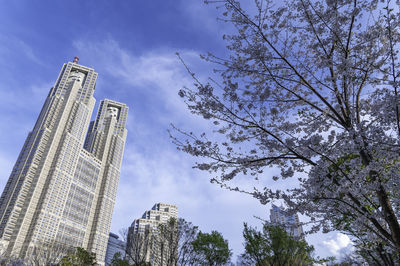 Low angle view of skyscrapers against sky