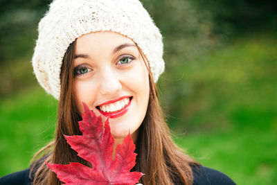 Close-up portrait of a smiling young woman