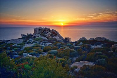 Scenic view of sea against sky during sunset