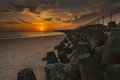 Scenic view of beach during sunset