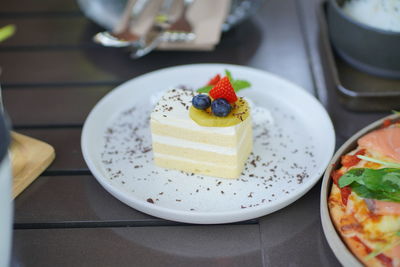 High angle view of cake in plate on table