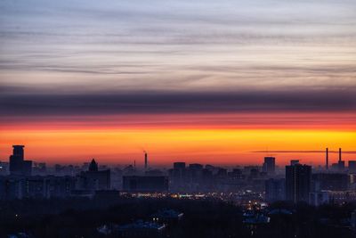 Cityscape against sky during sunset