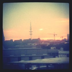 Built structure against sky at sunset