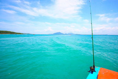Scenic view of sea against blue sky