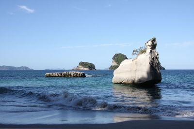 Scenic view of sea against blue sky