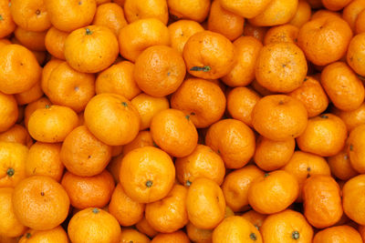 Full frame shot of oranges at market stall