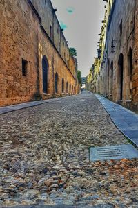 Narrow alley along buildings