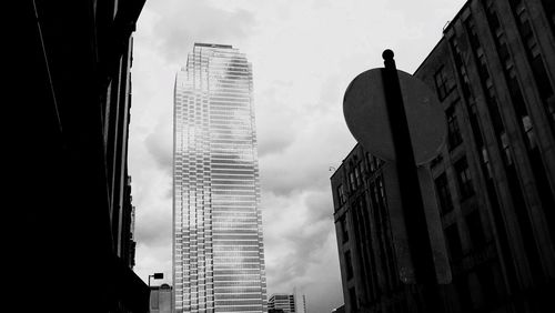 Low angle view of skyscrapers against sky