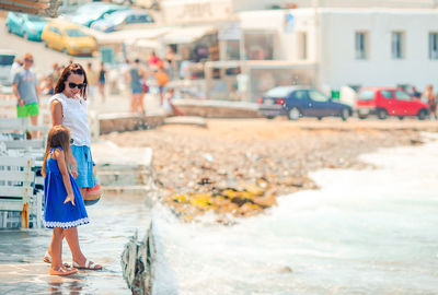 Woman standing in city