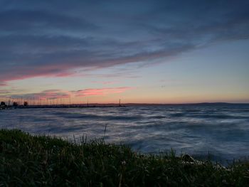 Scenic view of sea at sunset