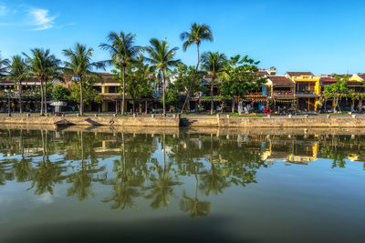 Thu bon river and an hoi town reflection taken from hoi an ancient town river bank.