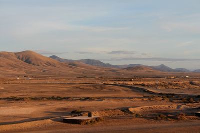 Scenic view of desert against sky