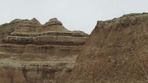 Low angle view of mountains against clear sky