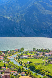 High angle view of townscape by sea