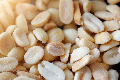 This is a salted peeled peanut close-up. useful nuts.background. top view