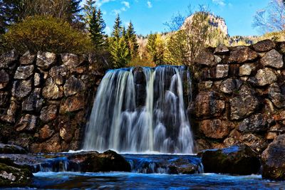 Scenic view of waterfall in forest