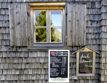 Close-up of text on window