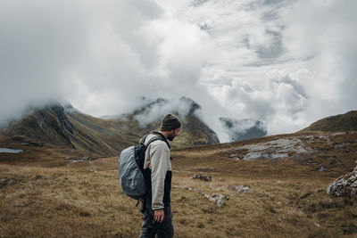 Full length of man standing on mountain