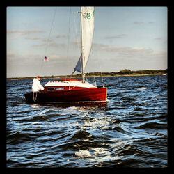 Boats sailing in sea