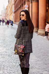 Beautiful woman walking in city