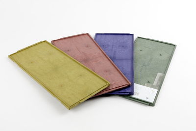 Close-up of open book against white background