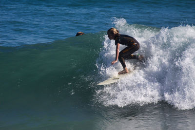 Man surfing in sea