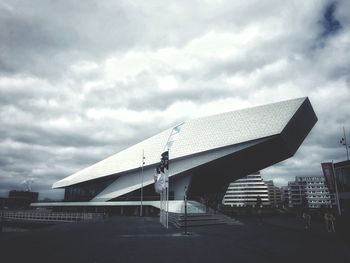 Modern buildings against sky in city