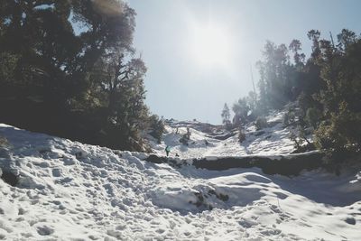 Scenic view of snow covered mountains against sky