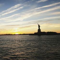 Statue of liberty at sunset