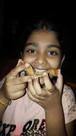 Portrait of a girl eating food